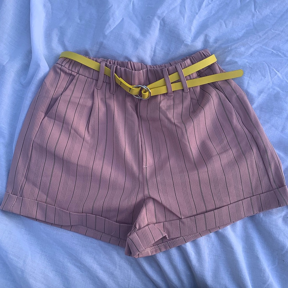 Pink high waisted shorts WITH yellow strapped belt